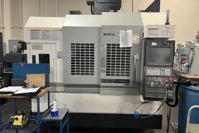 Okuma GENOS M560-V CNC machine