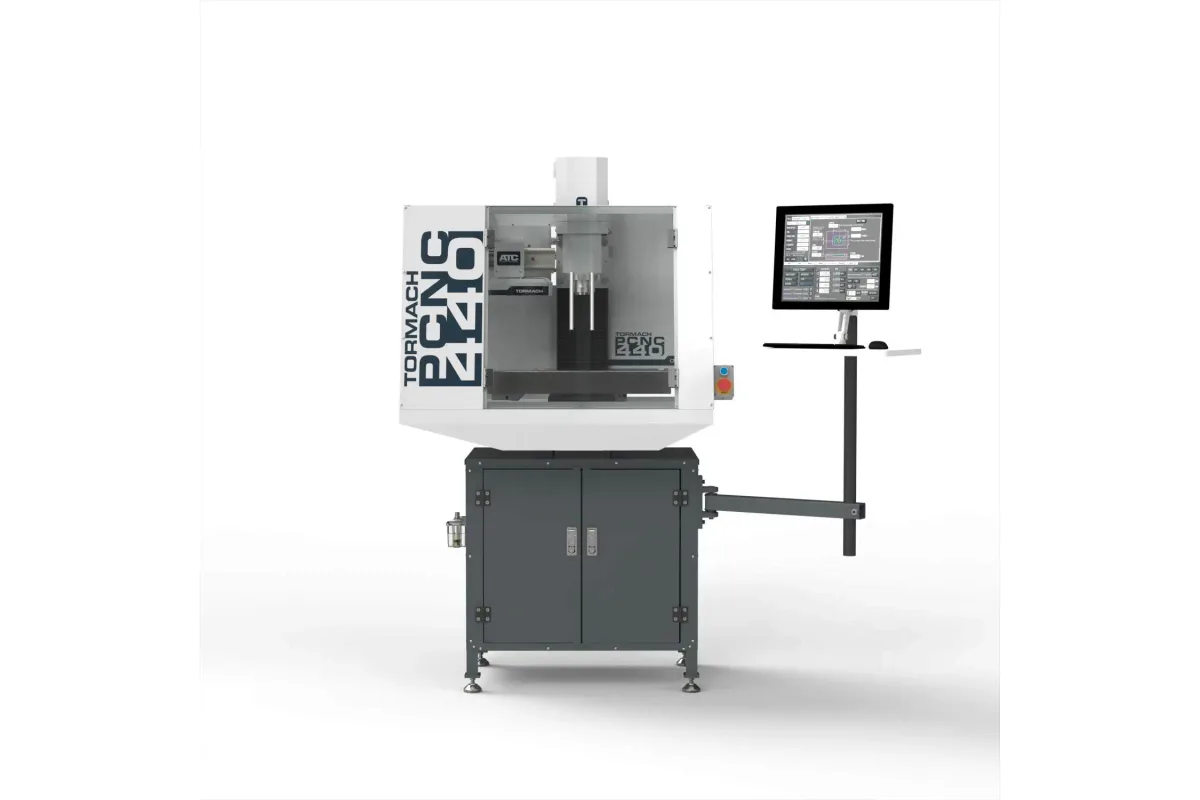 Tormach PCNC 440 CNC mill on stand with enclosure and tool changer